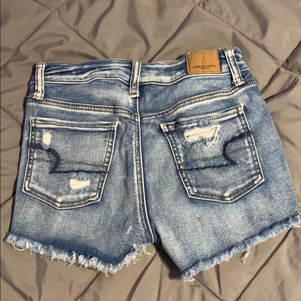 Light wash ripped American eagle shorts